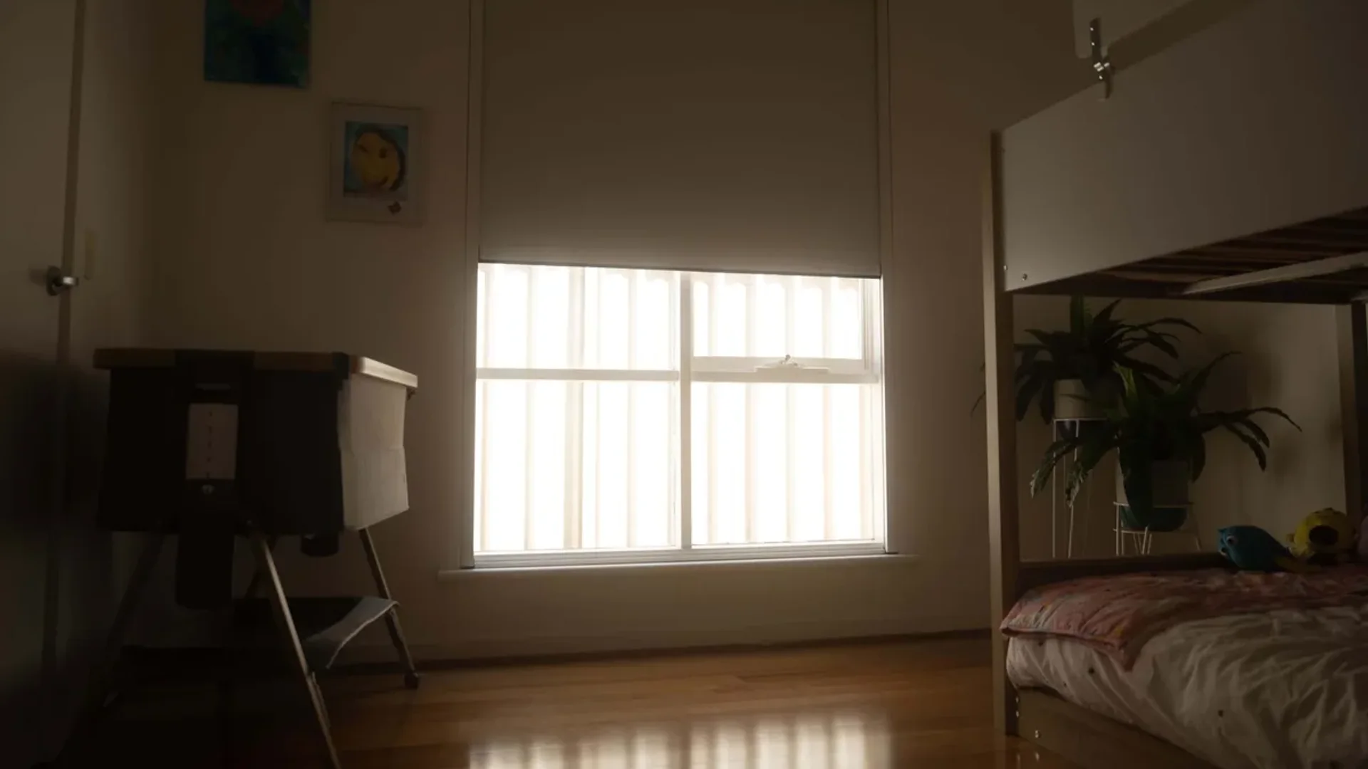 LuxOut internal blackout blind system installed in a darkened bedroom